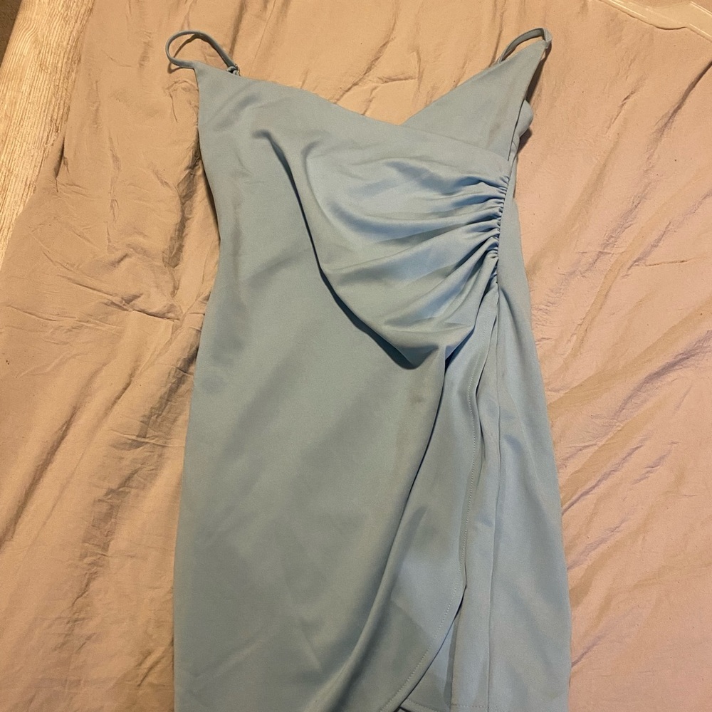 Light blue, short dress.